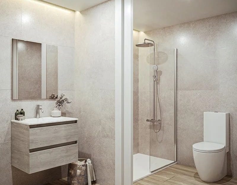 Ванная комната с душевой кабиной и современным минималистичным дизайном.