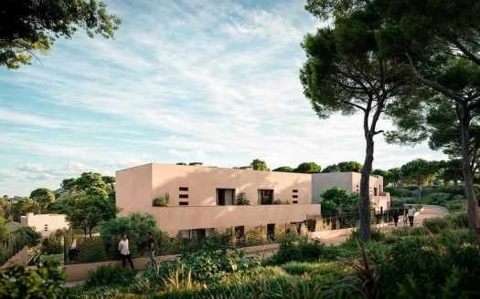 Внешний вид таунхауса в комплексе Sa Roda Begur среди зелёного ландшафта.