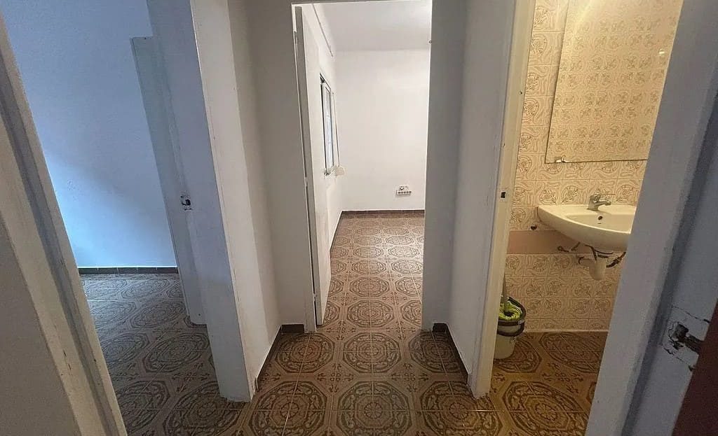 Коридор квартиры с доступом в спальни и ванную комнату