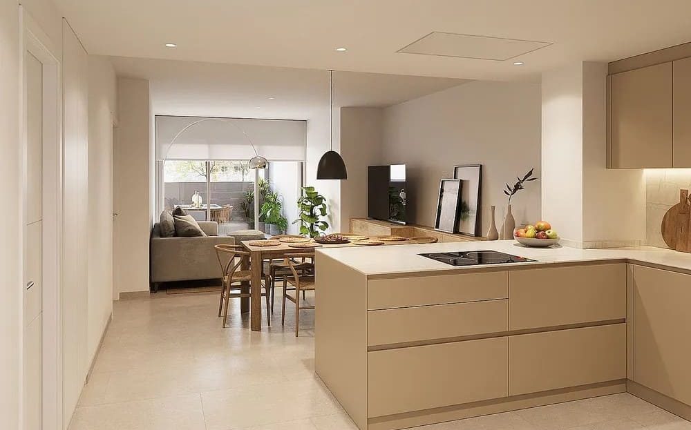 Кухня открытого типа с островом и встроенной техникой.