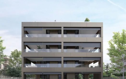 Фасад нового четырёхэтажного жилого комплекса с большими террасами