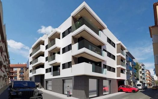 Фасад нового жилого дома в центре Торредембарры