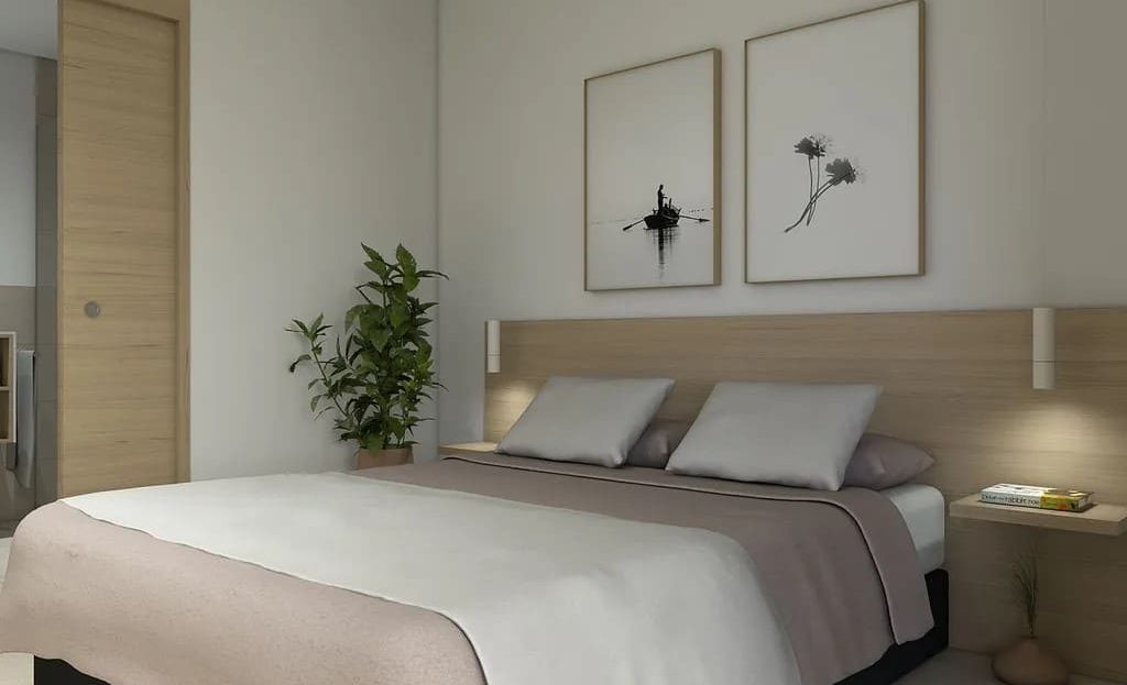 Спальня в новостройке с нейтральным современным интерьером