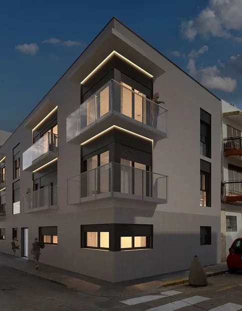 Здание ELAND-SITGES в вечернее время, современная архитектура