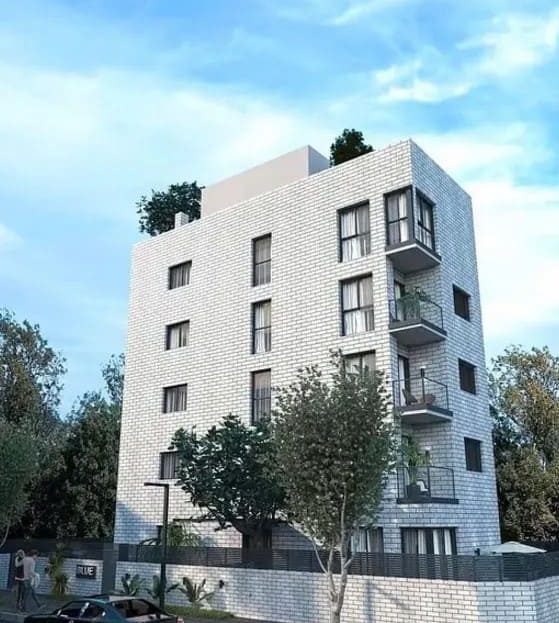 Визуализация жилого здания с нескольких ракурсов с балконами и зелёными зонами.