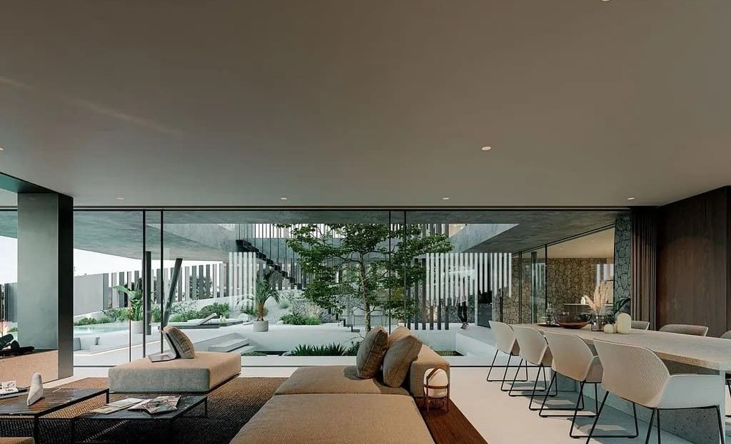 Просторная гостиная открытой планировки с выходом на террасу