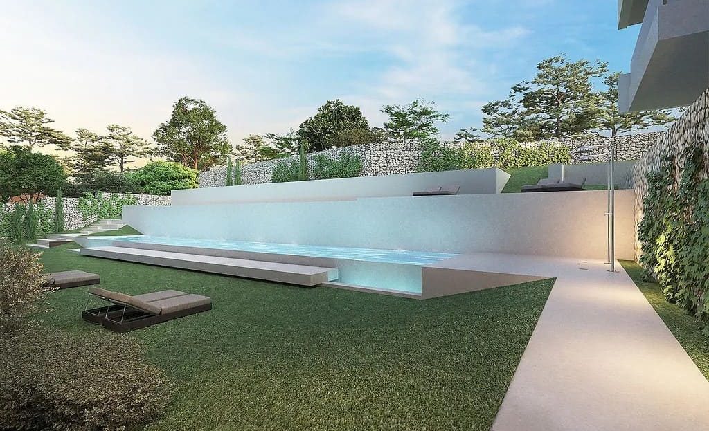 Бассейн с лаунж-зоной и ландшафтным дизайном