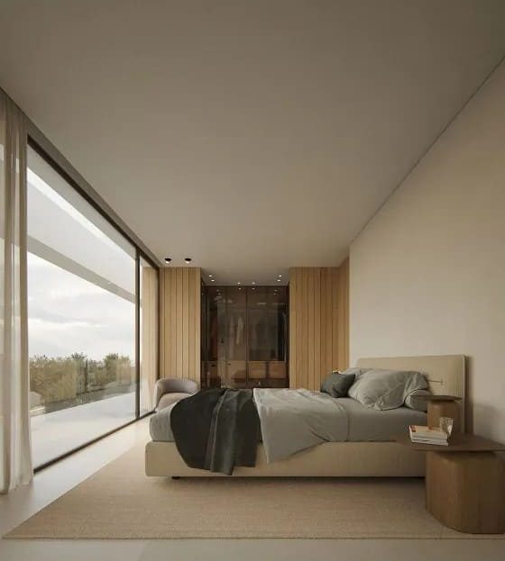 Спальня с панорамным окном и видом на природу