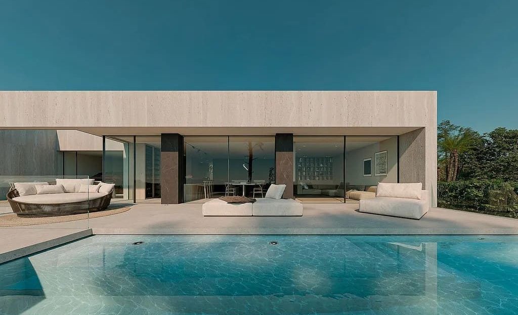 Инфинити-бассейн у современного дома с зоной отдыха